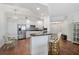 Modern white kitchen with stainless steel appliances at 385 N Point Rd # 402, Osprey, FL 34229