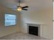 Living room with fireplace and tile floors at 3875 59Th W Ave # 3875, Bradenton, FL 34210