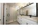 Modern bathroom with double vanity and walk-in shower at 407 Gowdy Rd, Sarasota, FL 34237