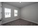 Well-lit bedroom with neutral walls and carpet flooring at 407 Gowdy Rd, Sarasota, FL 34237