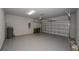 Attached garage with epoxy flooring at 407 Gowdy Rd, Sarasota, FL 34237