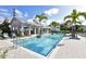 Relaxing pool area with plenty of lounge chairs and a cabana at 407 Gowdy Rd, Sarasota, FL 34237