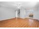 Living room with hardwood floors, neutral walls, and stairs at 412 30Th E St, Palmetto, FL 34221