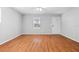 Spacious living room with hardwood floors and neutral walls at 412 30Th E St, Palmetto, FL 34221