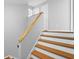 Indoor staircase with wood and white painted risers at 412 30Th E St, Palmetto, FL 34221