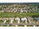 Aerial view of the house and surrounding golf course at 4221 Augusta E Ter, Bradenton, FL 34203