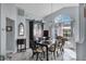 Formal dining room with a large arched window and chandelier at 4221 Augusta E Ter, Bradenton, FL 34203