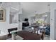 Elegant dining room with dark wood table and chairs, and view to living room at 4221 Augusta E Ter, Bradenton, FL 34203