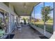 Relaxing screened porch overlooking a lush green yard at 4221 Augusta E Ter, Bradenton, FL 34203