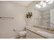 Clean bathroom with granite countertop, single sink, and shower at 4264 Central Sarasota Pkwy # 122, Sarasota, FL 34238