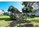 Wooden gazebo overlooking a pond with fountain at 4264 Central Sarasota Pkwy # 122, Sarasota, FL 34238