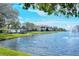 Scenic lake view with gazebo and lush landscaping at 4264 Central Sarasota Pkwy # 122, Sarasota, FL 34238