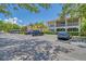 Community parking lot with ample spaces for residents at 4264 Central Sarasota Pkwy # 122, Sarasota, FL 34238