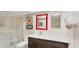 Updated bathroom with a large mirror and modern vanity at 4372 Woodmans Chart # 143, Sarasota, FL 34235