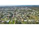 Aerial view of a house nestled in a neighborhood near the ocean at 462 Rubens E Dr, Nokomis, FL 34275