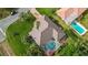 Aerial view of a house with a pool, showcasing its location in a residential neighborhood at 462 Rubens E Dr, Nokomis, FL 34275