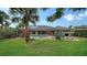 Spacious backyard with pool and lush landscaping at 462 Rubens E Dr, Nokomis, FL 34275