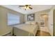 Guest bedroom with queen-size bed and access to a shared bathroom at 462 Rubens E Dr, Nokomis, FL 34275