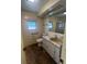 Bathroom with sink, shower, and toilet at 510 50Th Avenue W Dr, Bradenton, FL 34207