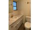 Clean bathroom with single sink vanity and toilet at 510 50Th Avenue W Dr, Bradenton, FL 34207