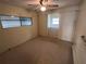 Bright bedroom featuring carpet flooring and built-in dresser at 510 50Th Avenue W Dr, Bradenton, FL 34207