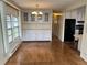 Dining area with wood flooring and built-in cabinetry at 510 50Th Avenue W Dr, Bradenton, FL 34207