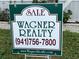 Wagner Realty sale sign with contact information at 510 50Th Avenue W Dr, Bradenton, FL 34207