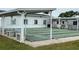 Community shuffleboard courts with covered seating at 510 50Th Avenue W Dr, Bradenton, FL 34207