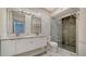 Modern bathroom with double vanity and walk-in shower at 5180 Northridge Rd # 101, Sarasota, FL 34238