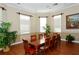 Elegant dining room with a large table and comfortable chairs at 5180 Northridge Rd # 101, Sarasota, FL 34238