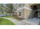 Exterior view showing building, walkway, landscaping, and parking at 5180 Northridge Rd # 101, Sarasota, FL 34238