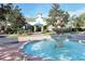 Community features a welcoming fountain with beautiful landscaping at 5180 Northridge Rd # 101, Sarasota, FL 34238