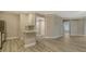 Modern kitchen with white cabinets and quartz countertops at 5180 Northridge Rd # 101, Sarasota, FL 34238