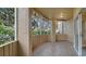 Screened-in lanai with tile flooring at 5180 Northridge Rd # 101, Sarasota, FL 34238