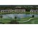 Aerial view of community with lake and golf course at 5251 Mahogany Run Ave # 524, Sarasota, FL 34241