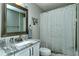 Bathroom with granite countertop and shower at 5251 Mahogany Run Ave # 524, Sarasota, FL 34241