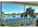 Scenic lanai showcasing a lake and golf course view at 5251 Mahogany Run Ave # 524, Sarasota, FL 34241