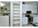 Spacious pantry with ample shelving for storage at 5251 Mahogany Run Ave # 524, Sarasota, FL 34241