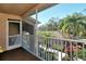 Private screened balcony overlooking trees and other condos at 5251 Mahogany Run Ave # 524, Sarasota, FL 34241