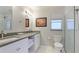 Modern bathroom with double vanity and walk-in shower at 5425 Skyline Pl, Sarasota, FL 34232