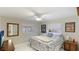 Bedroom with large bed and views of backyard at 5425 Skyline Pl, Sarasota, FL 34232