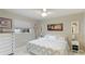 Bedroom with a queen bed and a dresser at 5425 Skyline Pl, Sarasota, FL 34232