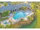 Aerial view of community pool and clubhouse at 5552 Eagle Creek Rd, Sarasota, FL 34238