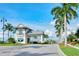 Gated community entrance with palm trees at 5552 Eagle Creek Rd, Sarasota, FL 34238