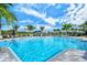 Relaxing pool area with plenty of lounge chairs at 5552 Eagle Creek Rd, Sarasota, FL 34238