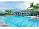 Large community pool with plenty of lounge chairs at 5552 Eagle Creek Rd, Sarasota, FL 34238