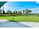 Expansive grassy dog park with seating at 5552 Eagle Creek Rd, Sarasota, FL 34238