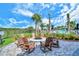 Community fire pit with surrounding seating at 5552 Eagle Creek Rd, Sarasota, FL 34238