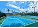 Community pickleball courts with seating nearby at 5552 Eagle Creek Rd, Sarasota, FL 34238