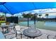 Relax under the shaded patio area near the pickleball courts at 5552 Eagle Creek Rd, Sarasota, FL 34238